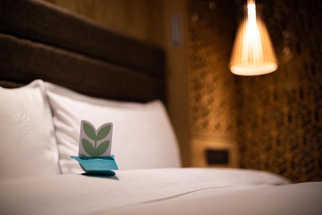 Postel nebo postele na pokoji v ubytování Hotel Château Anping