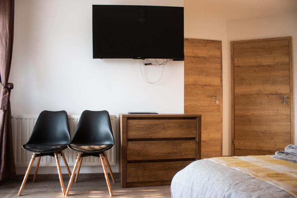 Postel nebo postele na pokoji v ubytování Turistična kmetija Sirk
