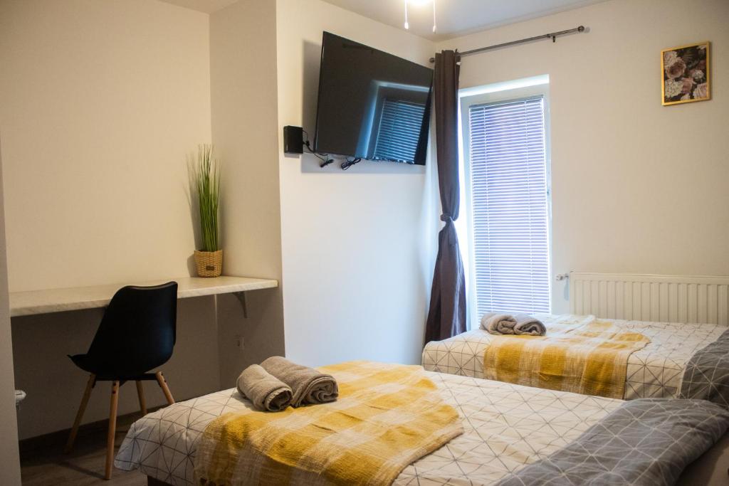 Postel nebo postele na pokoji v ubytování Turistična kmetija Sirk