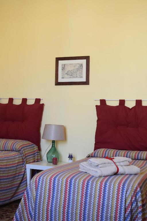 A bed or beds in a room at Venticello di mare
