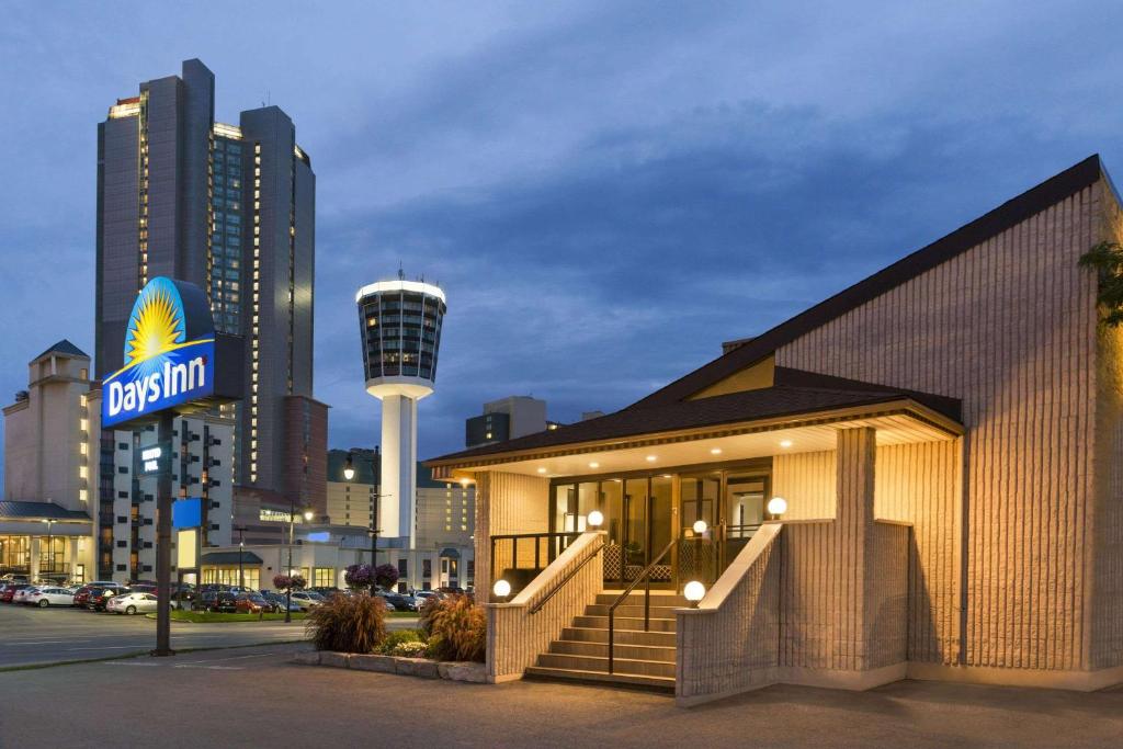 a fast food restaurant with a view of a city at Days Inn by Wyndham Fallsview in Niagara Falls