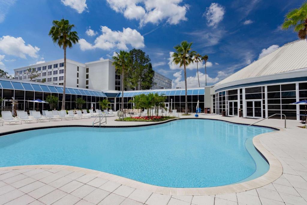 a large swimming pool in front of a building at Wyndham Orlando Resort & Conference Center, Celebration Area in Orlando