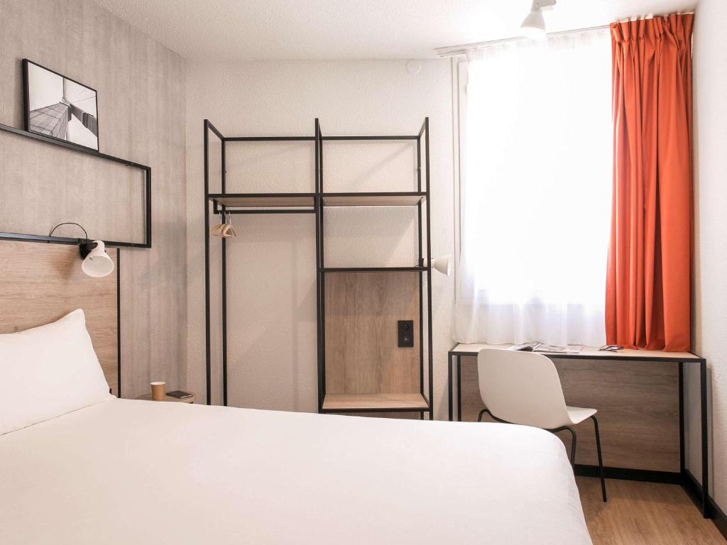 Postel nebo postele na pokoji v ubytování ibis Avignon Sud