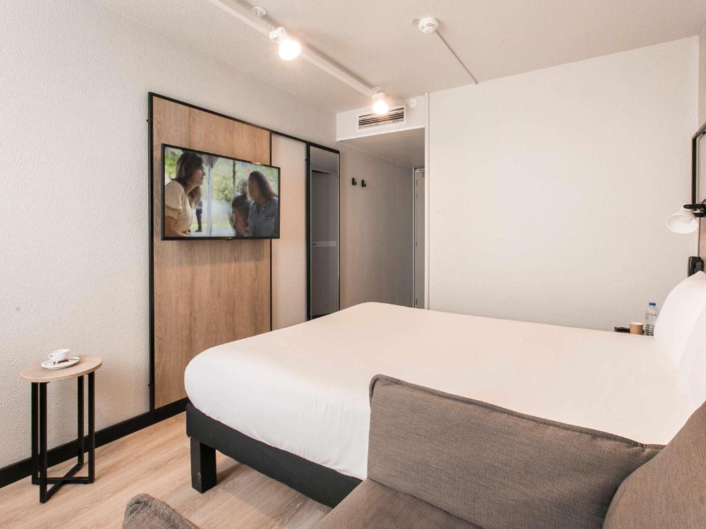 Postel nebo postele na pokoji v ubytování ibis Avignon Sud