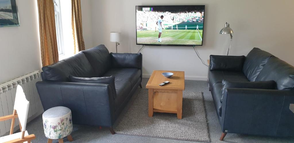 TV a/nebo společenská místnost v ubytování One The Cairns