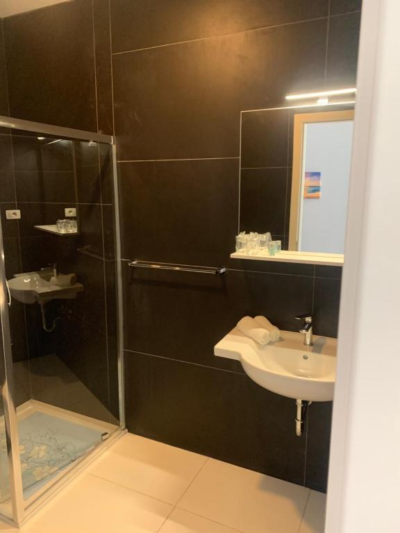 Kúpeľňa v ubytovaní Hotel Elu Iris