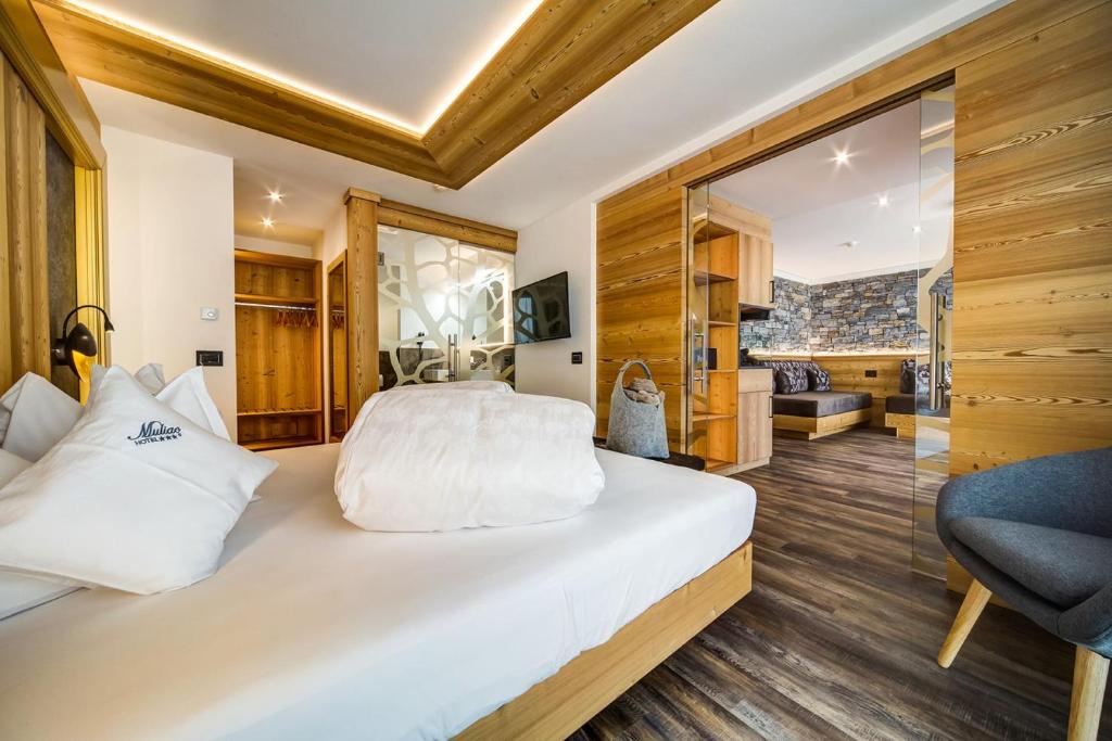 Postel nebo postele na pokoji v ubytování Hotel Muliac