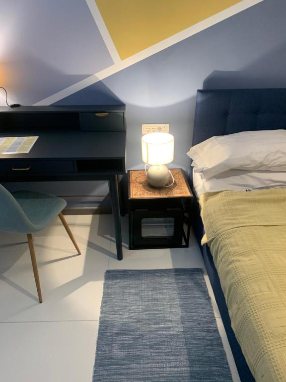 Posteľ alebo postele v izbe v ubytovaní Hotel Elu Iris