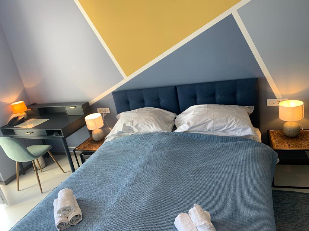 Posteľ alebo postele v izbe v ubytovaní Hotel Elu Iris