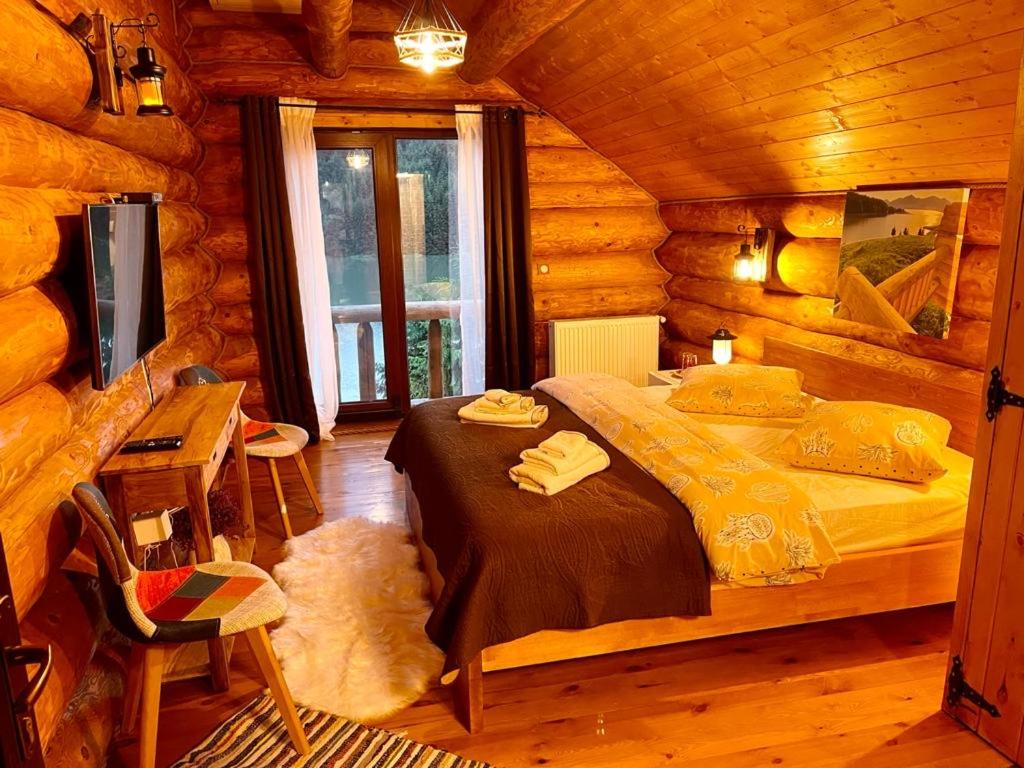 Postel nebo postele na pokoji v ubytování Chalet du Lac