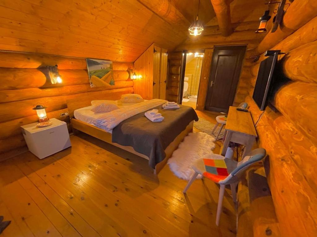 Postel nebo postele na pokoji v ubytování Chalet du Lac