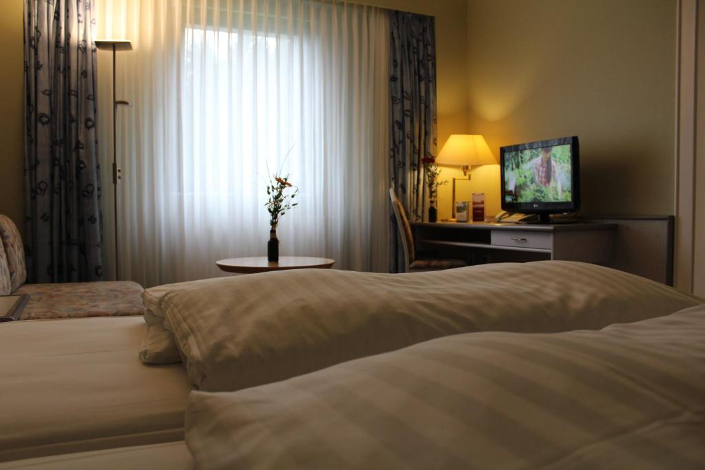 Voodi või voodid majutusasutuse Hotel Rennsteig toas