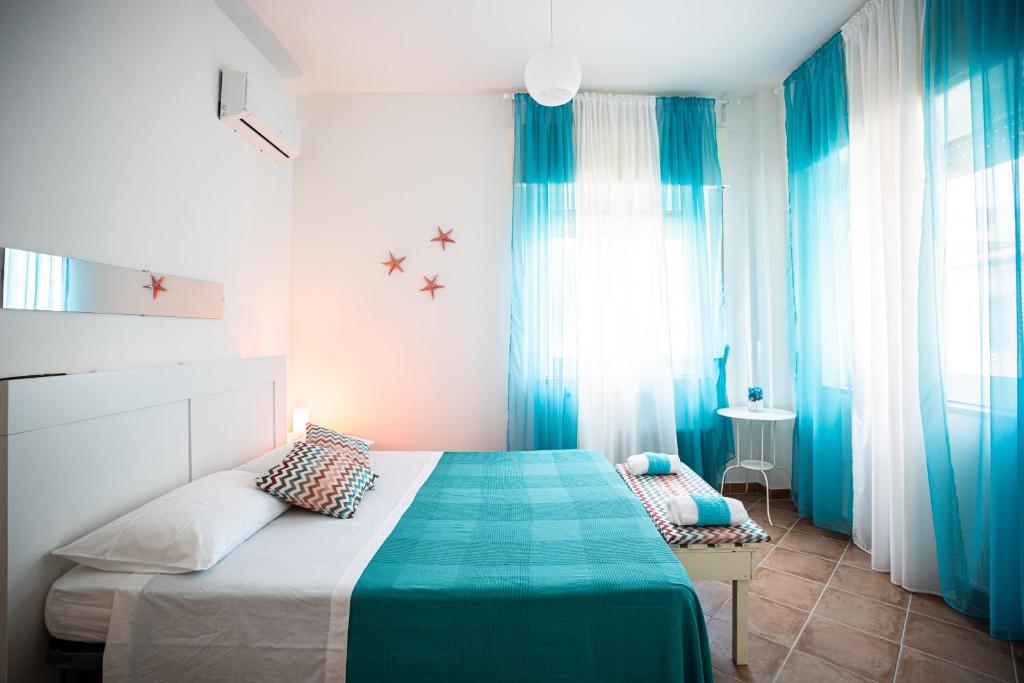 Posteľ alebo postele v izbe v ubytovaní CasaPo'