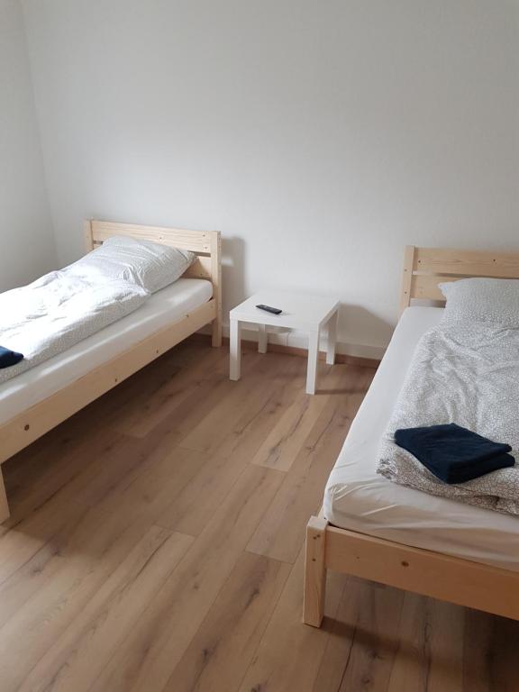 Postel nebo postele na pokoji v ubytování Vermietung-Maintal