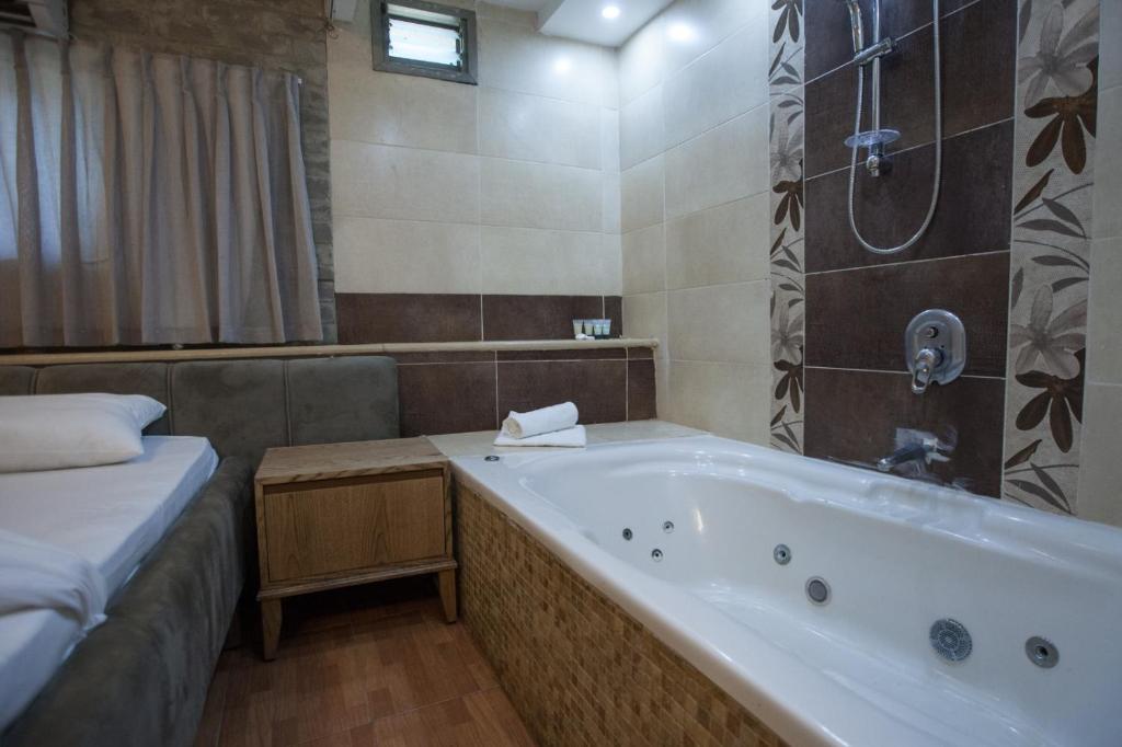Koupelna v ubytování Puy Ahuzat Haosher Hotel