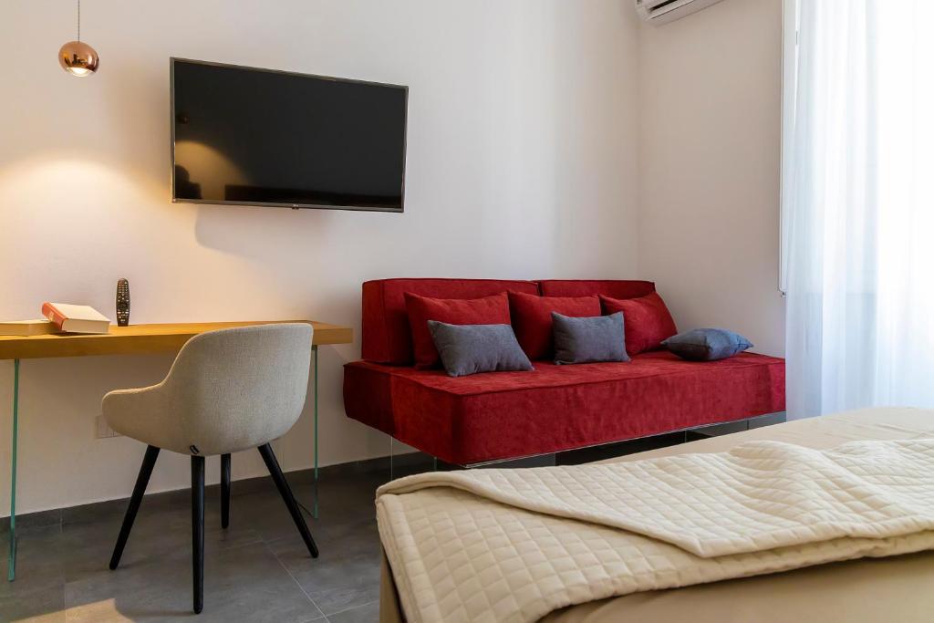 Televízia a/alebo spoločenská miestnosť v ubytovaní 32Venti Comfort Apartments Trapani