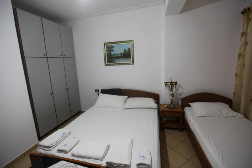 Postel nebo postele na pokoji v ubytování Vila Asidanu