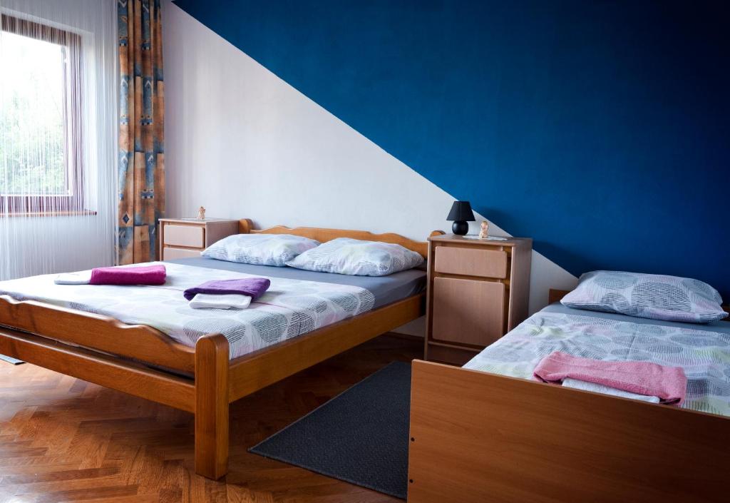 Posteľ alebo postele v izbe v ubytovaní Kuća za odmor Mažuran
