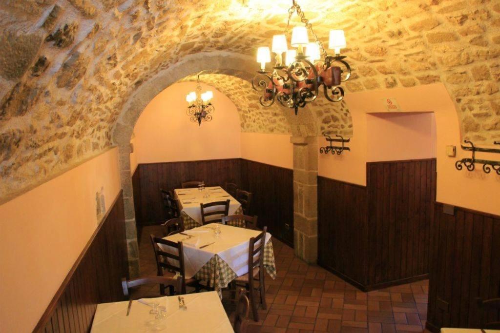 Reštaurácia alebo iné gastronomické zariadenie v ubytovaní Guerrin Meschino