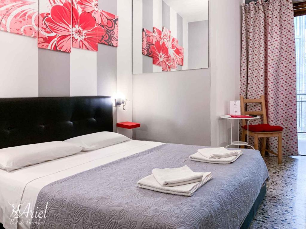 Postel nebo postele na pokoji v ubytování Ariel B&B
