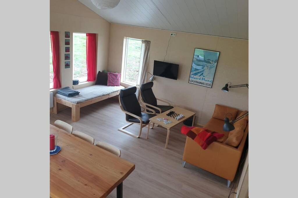 TV a/nebo společenská místnost v ubytování Árheimar 6 cosy holiday home
