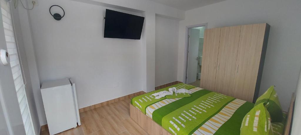 Postel nebo postele na pokoji v ubytování Casa Francisc