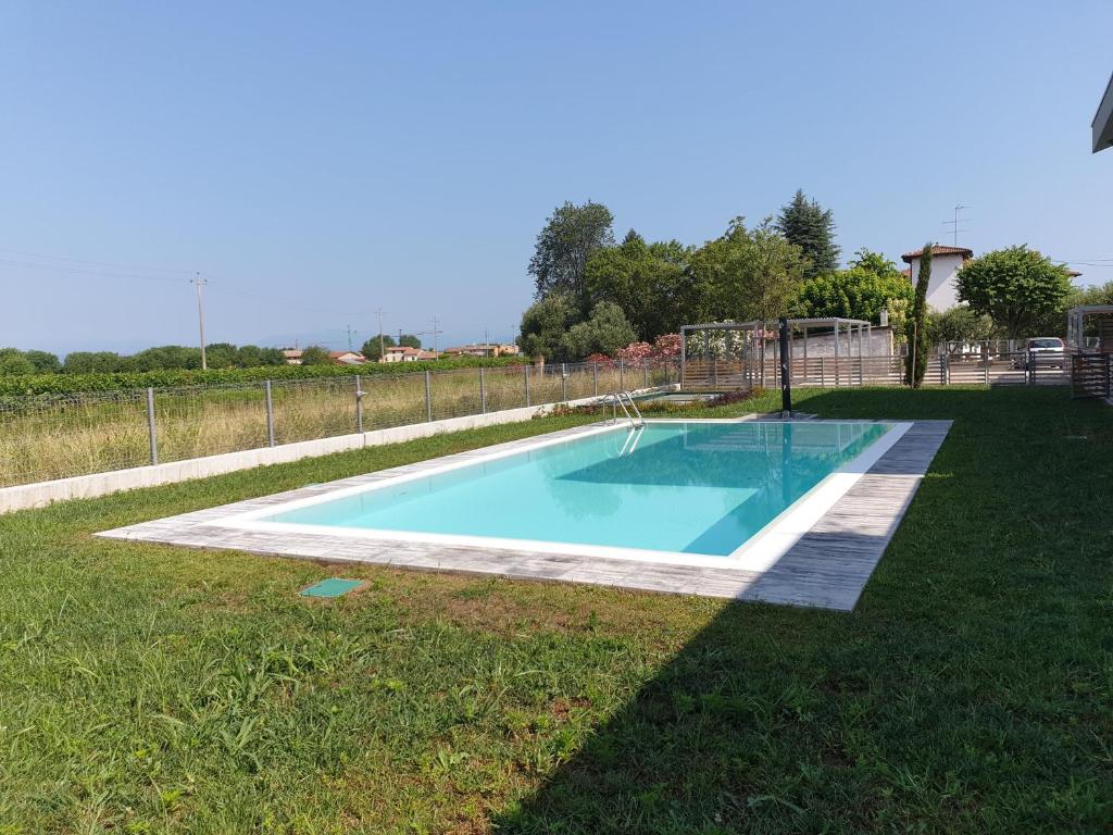 Bazén v ubytování Villa Volponi nebo v jeho okolí