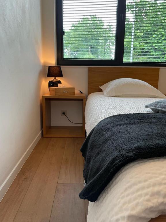 Postel nebo postele na pokoji v ubytování Hotel Gasthof Kapelhof