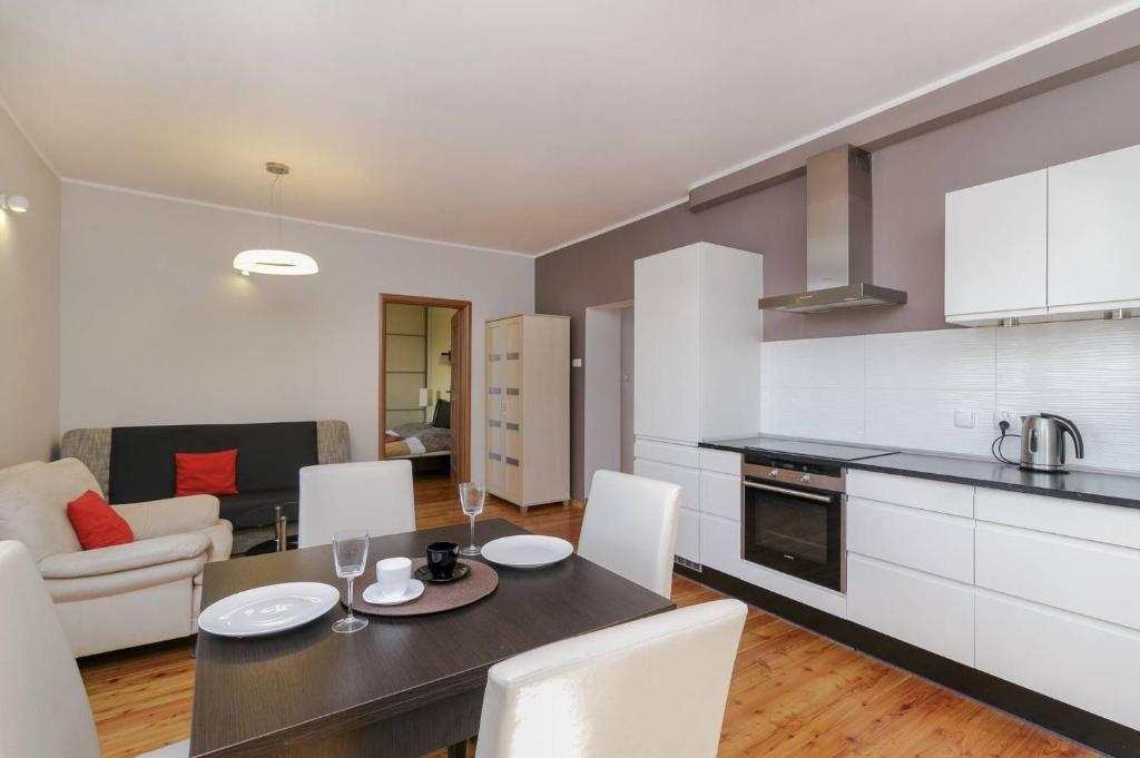 Kuchyňa alebo kuchynka v ubytovaní Apartamenty Haffnera by Grand Apartments