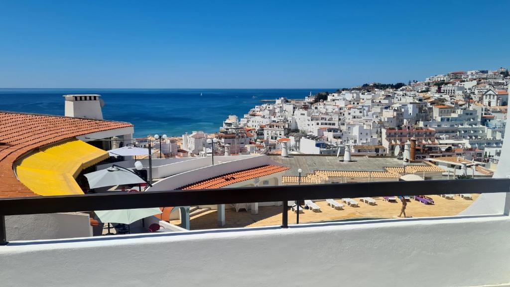 a view of a city from a balcony at Albufeira, One step to the beach (13) in Albufeira