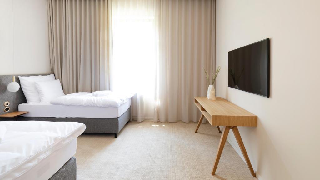 Letto o letti in una camera di BASKE VILLA