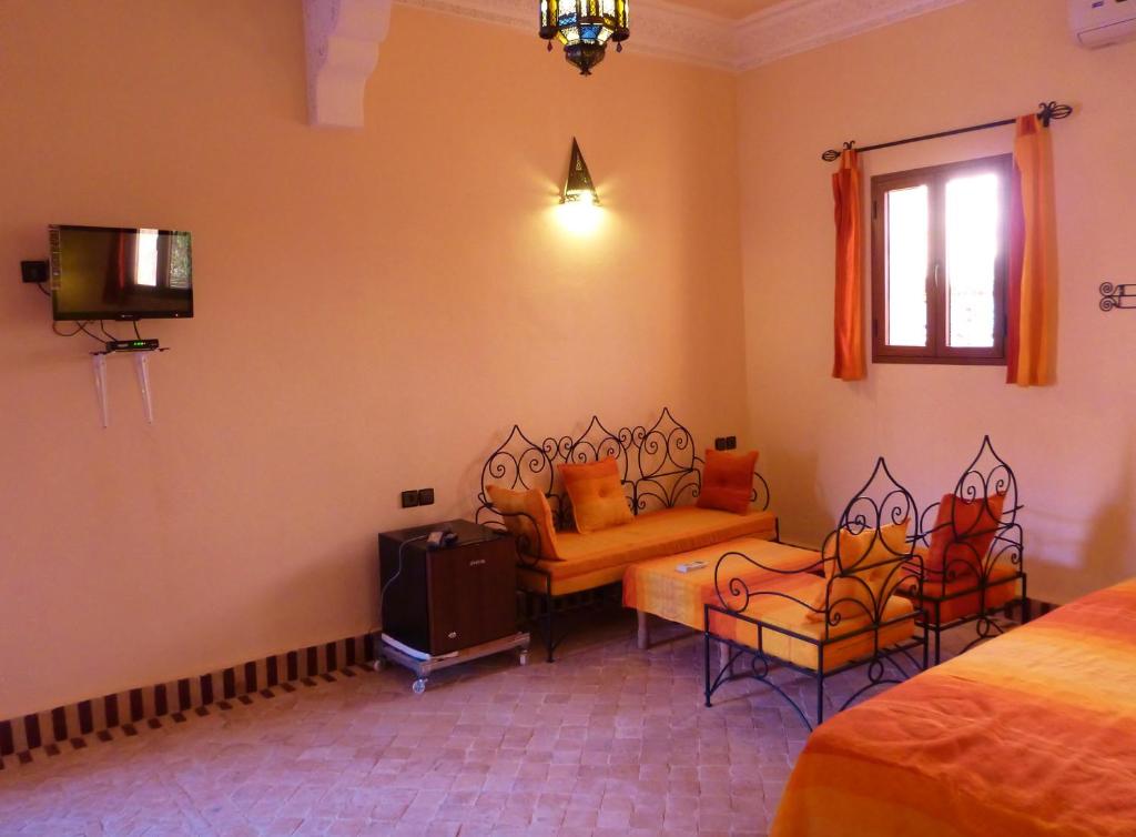 Postel nebo postele na pokoji v ubytování Auberge La Source