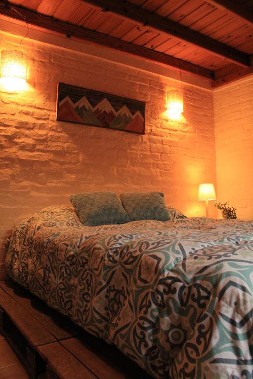 Postel nebo postele na pokoji v ubytování B&B Casa Nómada