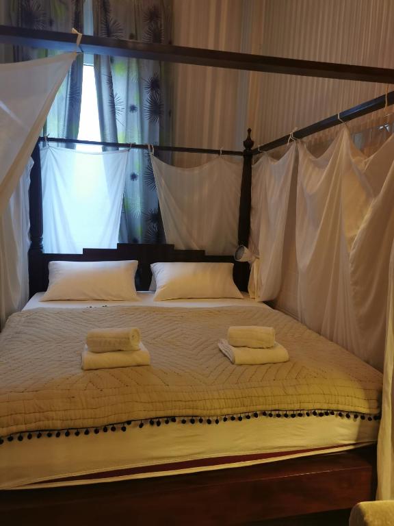 Postel nebo postele na pokoji v ubytování Boutique Hostel LEKKERURLAUB