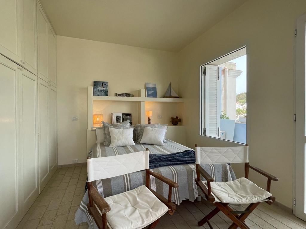 Giường trong phòng chung tại Villa Marisa - La Guarida