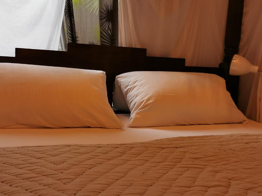 Postel nebo postele na pokoji v ubytování Boutique Hostel LEKKERURLAUB