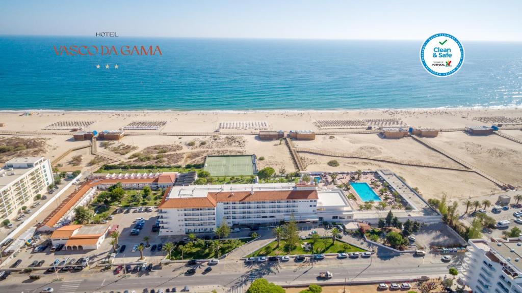 an aerial view of a resort and the beach at Hotel Vasco Da Gama in Monte Gordo