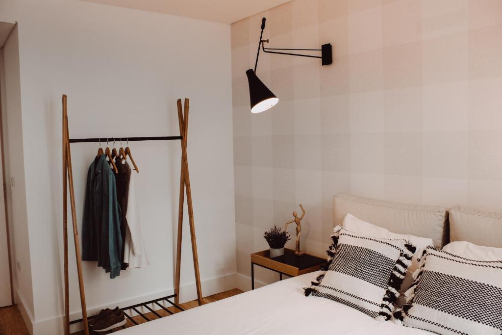 Posteľ alebo postele v izbe v ubytovaní Oporto Garden's Home