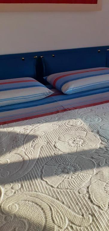 Postel nebo postele na pokoji v ubytování B&B Ca di me