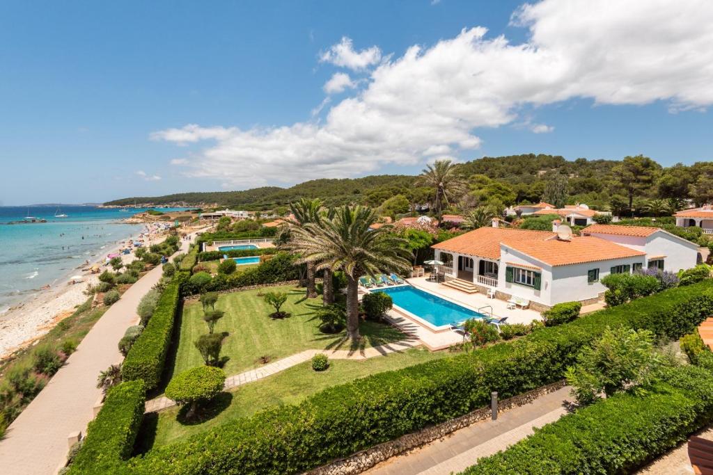 an aerial view of a house and the beach at Villa Nereida in Es Migjorn Gran