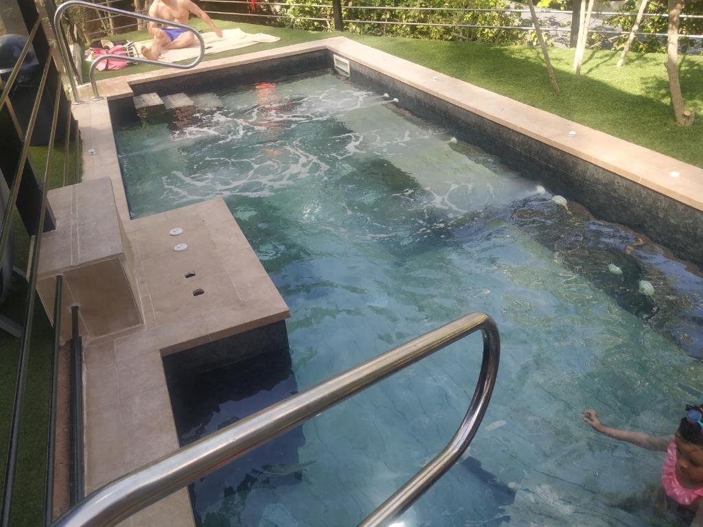 The swimming pool at or close to Posada Rural SPA Granja LA TEJERA de Lozoya
