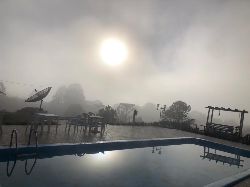 Bazén v ubytování Pousada Fazenda da Invernada nebo v jeho okolí