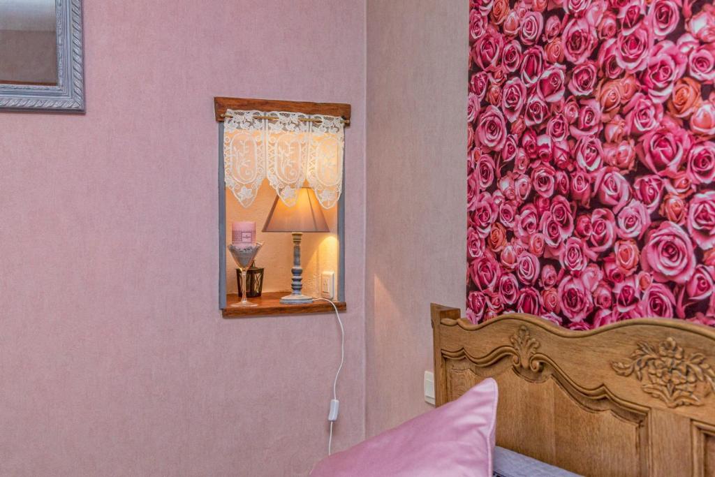 Postel nebo postele na pokoji v ubytování manoir de vauville