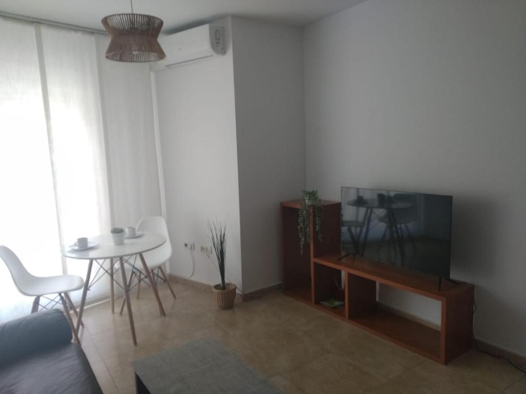 Televízia a/alebo spoločenská miestnosť v ubytovaní Love Rent4 Málaga Spiteri