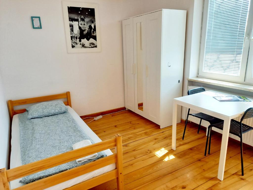 Posteľ alebo postele v izbe v ubytovaní Pokoje Slawin