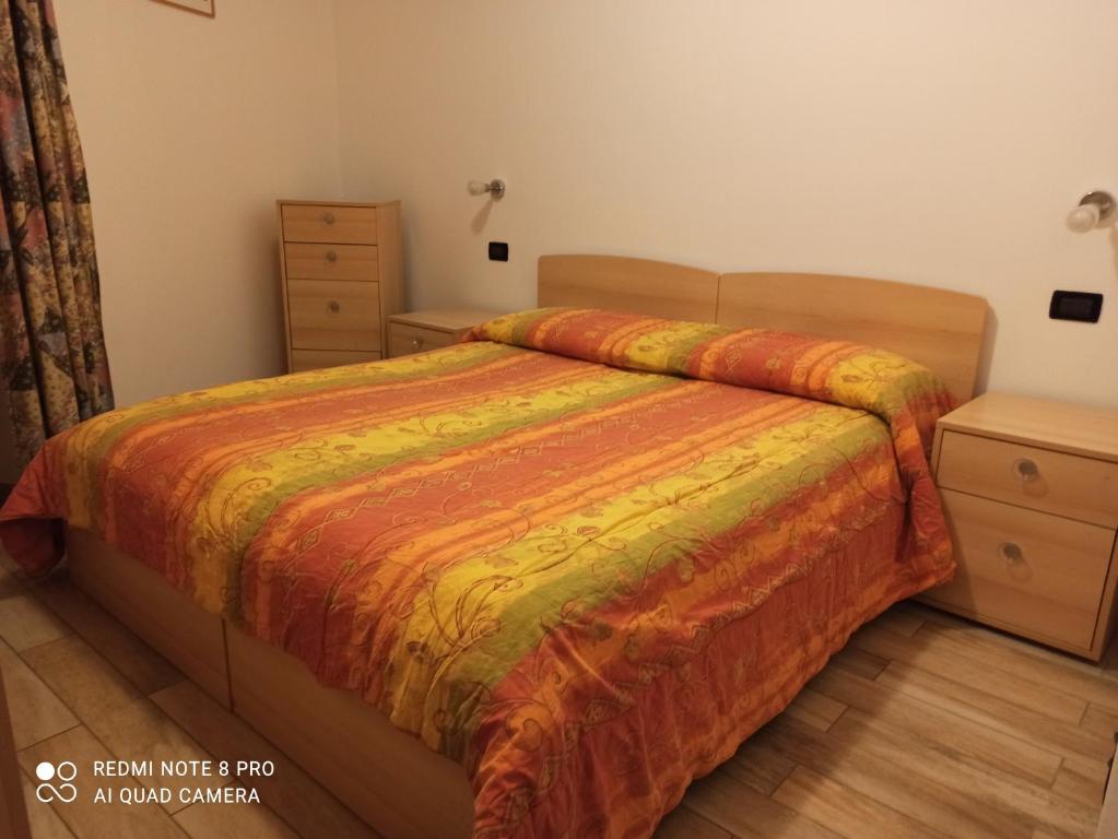 Postel nebo postele na pokoji v ubytování La casa di Nonna Lia
