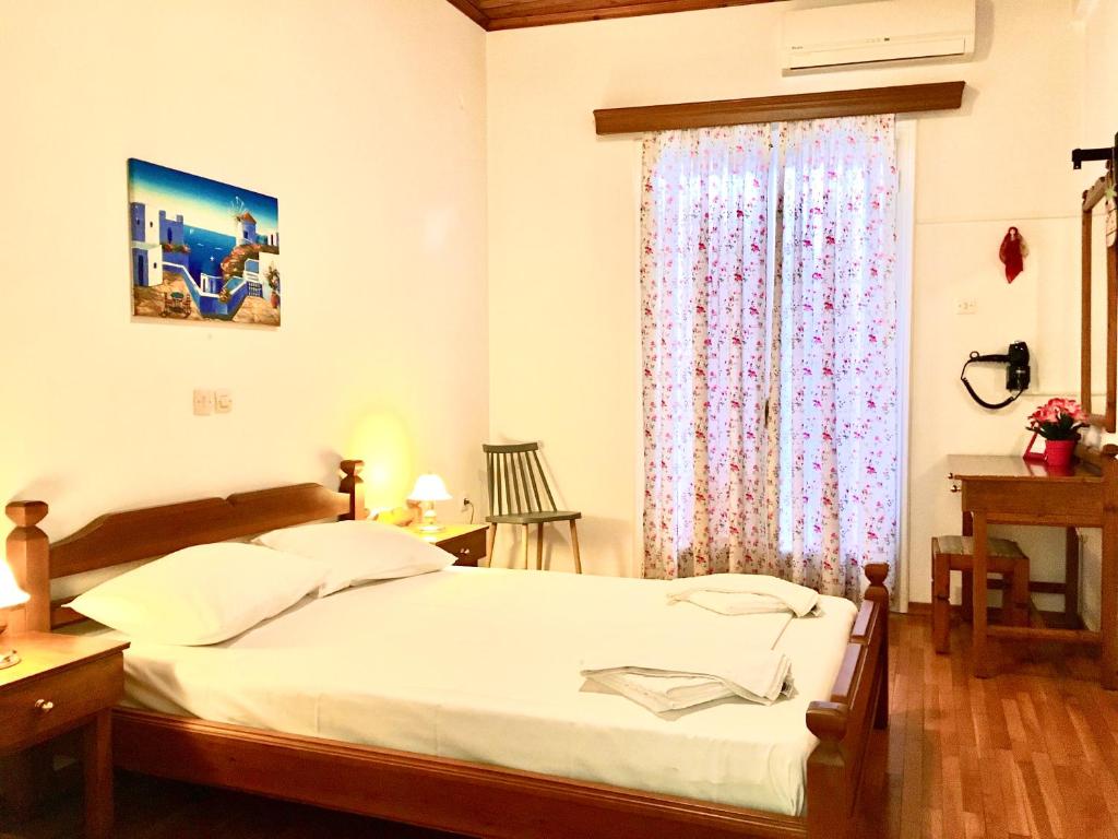 Postel nebo postele na pokoji v ubytování Epic Rooms