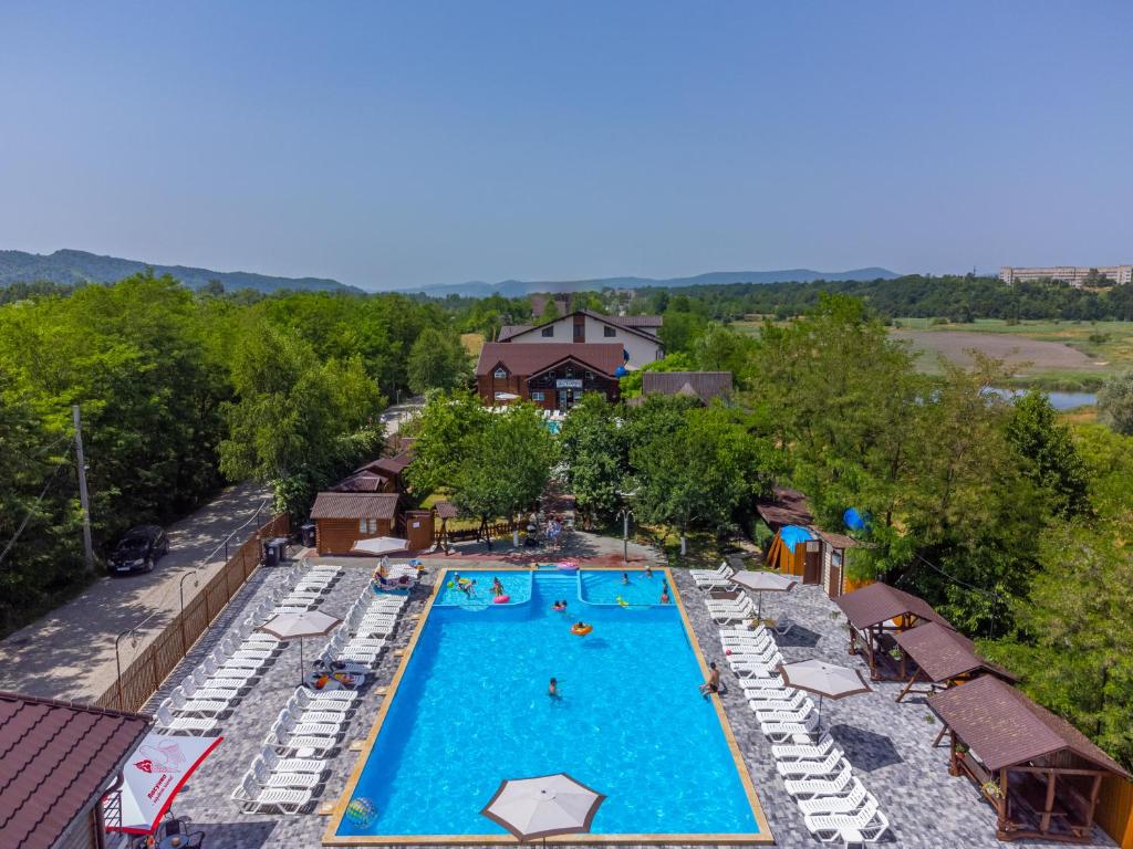 an overhead view of a swimming pool at a resort at ASTORIA in Solotvyno