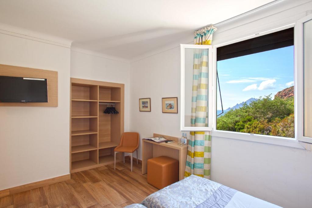 TV a/nebo společenská místnost v ubytování Hotel Kalliste