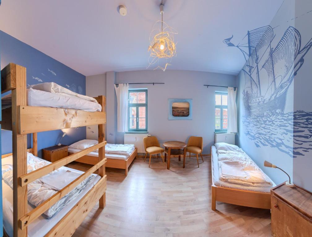 Letto o letti in una camera di Labyrinth Hostel Weimar
